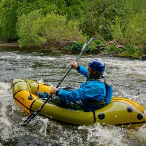 Packrafting Guide: The Anfibio Revo XL is being used on the Tirio Packraft Paddlers Course on the Welsh river Dee.